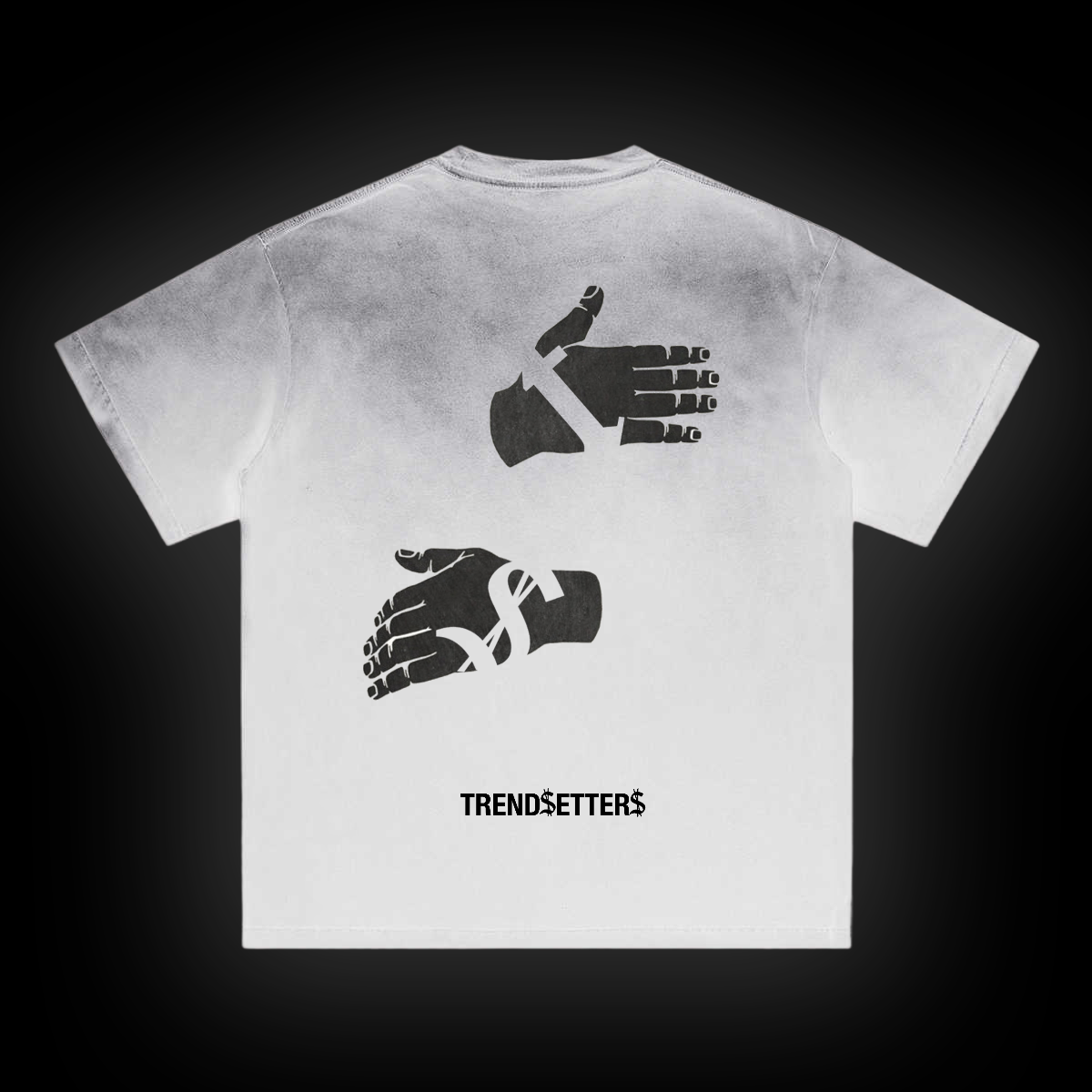 White t-shirt with black hands graphic design and 'Trendsetters' text on a dark background